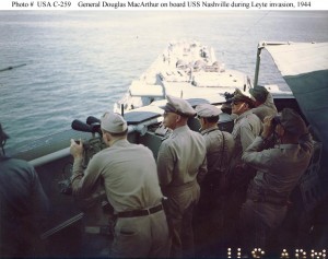 General Douglas MacArthur (right, seen in profile) on the bridge of USS Nashville (CL-43), off Leyte during the landings there in late October 1944. Standing in the center (also seen in profile) is Lieutenant General George C. Kenney. Photograph from the Army Signal Corps Collection in the U.S. National Archives.